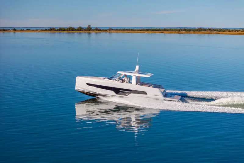 Slide: The Image of 2023 Fjord 41 XL yacht cruising on calm blue waters. - 64