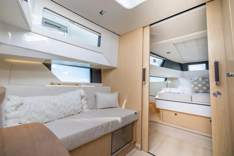 Slide: The Image of Luxurious interior of 2023 Fjord 41 XL yacht with modern furnishings and natural light. - 57
