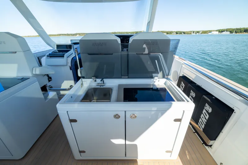 Slide: The Image of Modern kitchen area on 2023 Fjord 41 XL yacht with sink and stove. - 28