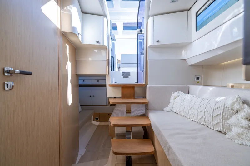 Slide: The Image of Interior of 2023 Fjord 41 XL yacht with modern design and cozy seating area. - 50