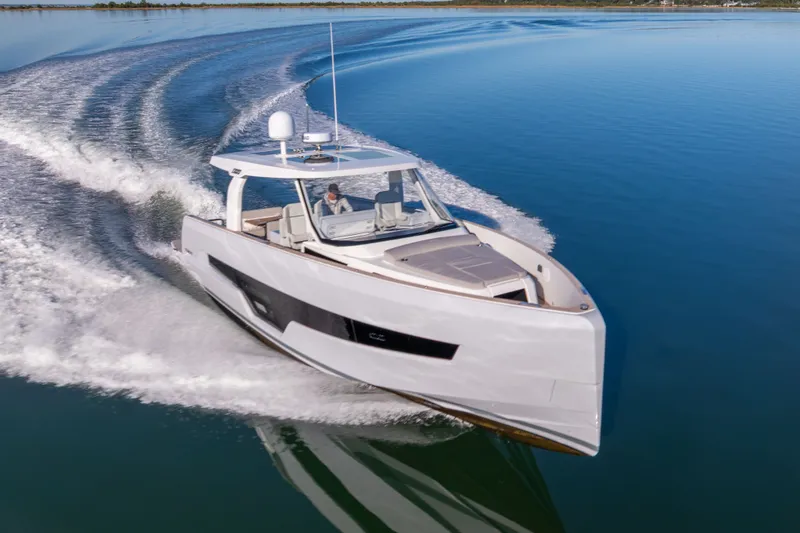 Slide: The Image of 2023 Fjord 41 XL yacht cruising on calm blue waters. - 65