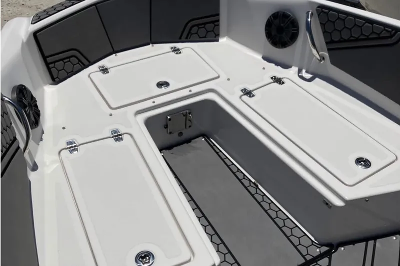 Slide: The Image of Spacious deck of 2017 Scarab 195 ID boat with storage compartments. - 13
