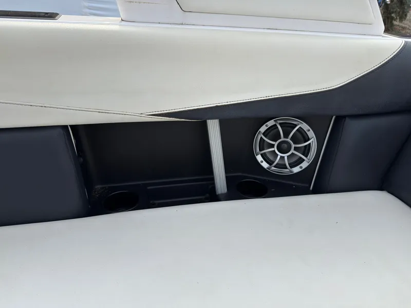 Slide: The Image of Close-up of a boat seat with speaker and cup holders. - 17