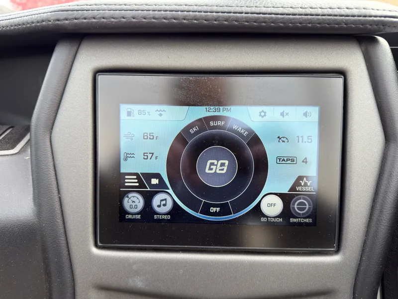 Slide: The Image of The image shows a control display of a 2020 ATX Surf Boats 22 Type-S. - 33