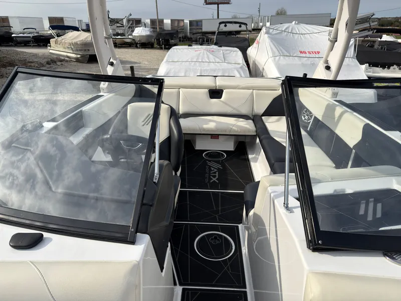 Slide: The Image of Interior view of a 2020 ATX Surf Boats 22 Type-S with white and black seating. - 42