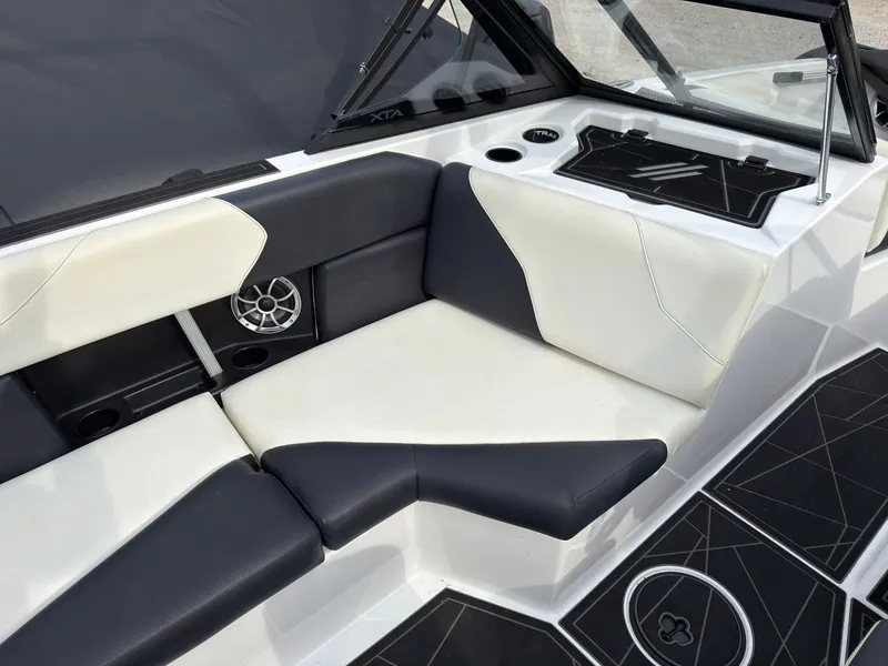 Slide: The Image of The image shows the stylish interior of a 2020 ATX Surf Boats 22 Type-S. - 22