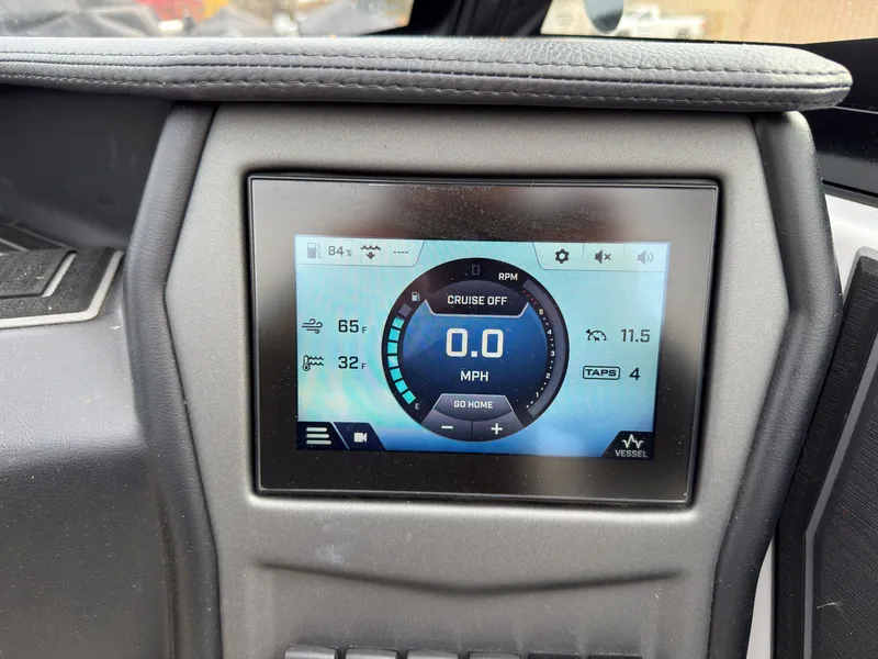 Slide: The Image of The image shows a digital dashboard with speedometer and other boat information. - 30