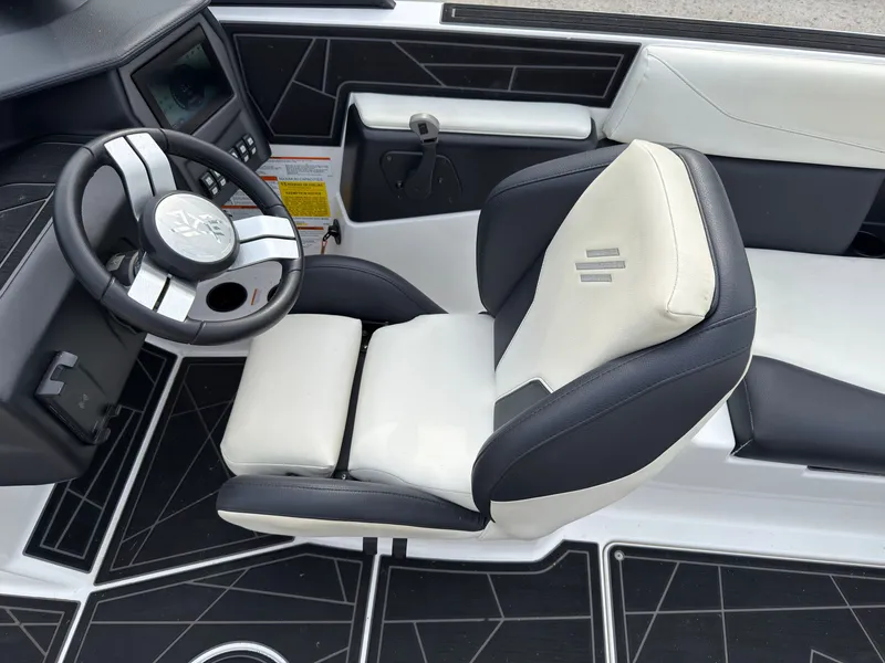 Slide: The Image of The image shows the helm of a 2020 ATX Surf Boats 22 Type-S with a modern design. - 26