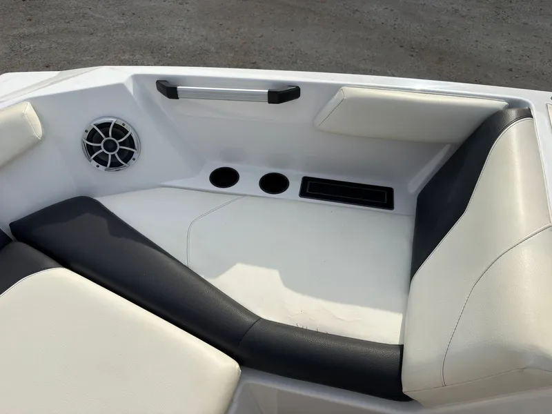 Slide: The Image of The image shows the bow area of an ATX Surf Boats 22 Type-S with white and black upholstery. - 40