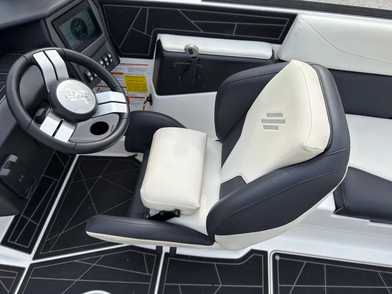 Slide: The Image of The image shows the driver's seat of a 2020 ATX Surf Boats 22 Type-S with modern design. - 27