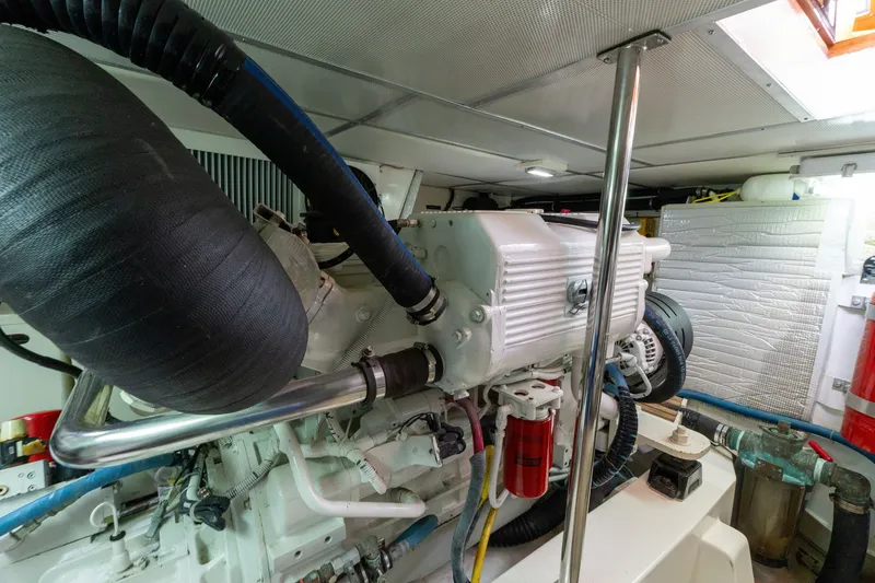 Slide: The Image of Engine room of 2009 Grand Banks 45 Eastbay SX yacht, showcasing mechanical components. - 78