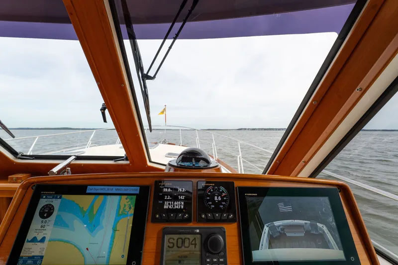 Slide: The Image of Grand Banks 45 Eastbay SX 2009 yacht cockpit with navigation screens and sea view. - 36