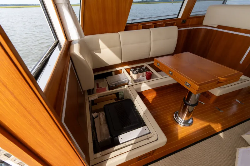 Slide: The Image of Interior of 2009 Grand Banks 45 Eastbay SX yacht with storage compartments open. - 45