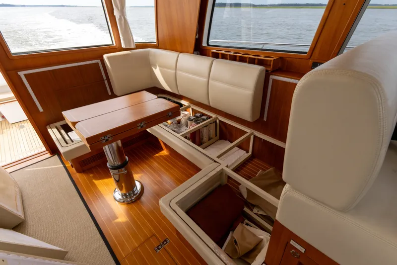 Slide: The Image of Luxurious 2009 Grand Banks 45 Eastbay SX yacht interior with elegant seating and storage. - 43