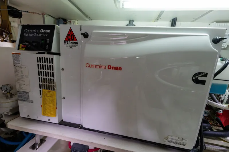 Slide: The Image of Cummins Onan marine generator in 2009 Grand Banks 45 Eastbay SX engine room. - 84