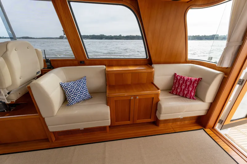 Slide: The Image of Luxurious interior of 2009 Grand Banks 45 Eastbay SX yacht with plush seating and scenic view. - 17