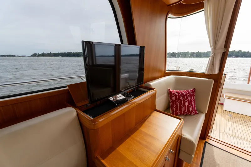 Slide: The Image of Interior of 2009 Grand Banks 45 Eastbay SX yacht with TV and seating area. - 19