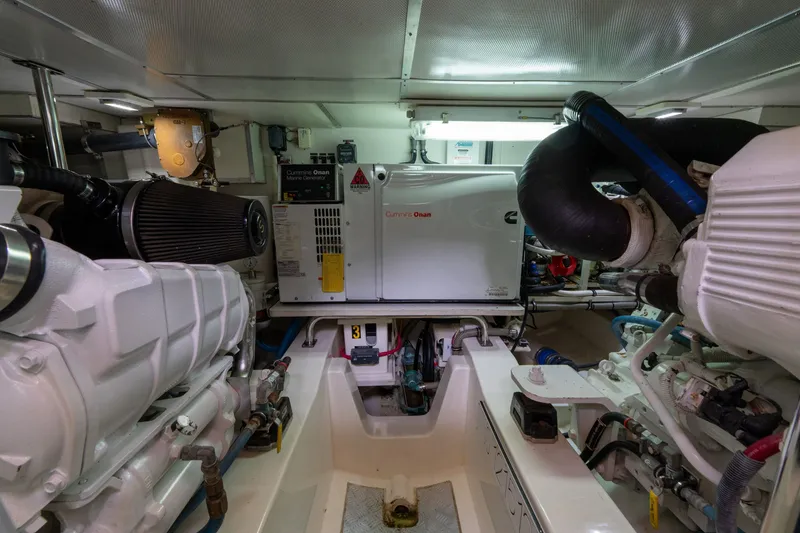 Slide: The Image of Engine room of 2009 Grand Banks 45 Eastbay SX with Cummins Onan generator. - 81