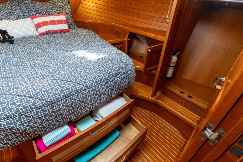 Slide: The Image of Luxurious 2009 Grand Banks 45 Eastbay SX cabin with cozy bedding and ample storage. - 71