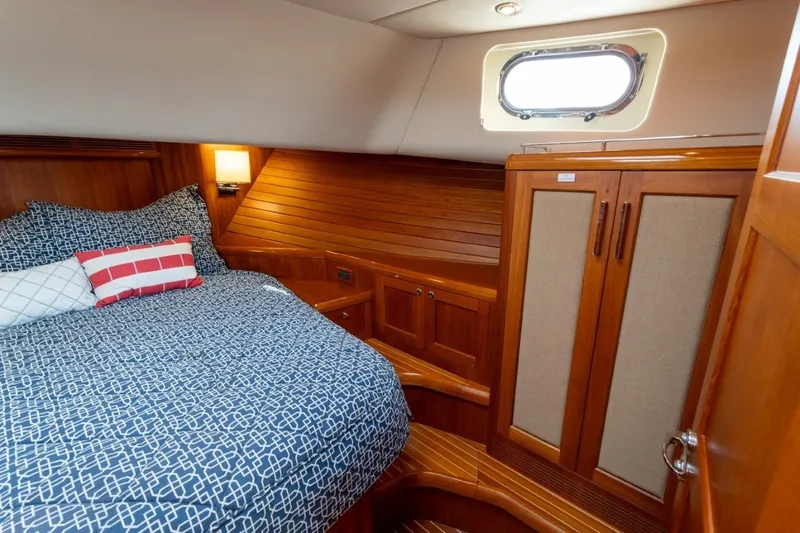 Slide: The Image of Luxurious cabin interior of 2009 Grand Banks 45 Eastbay SX yacht with cozy bedding. - 69