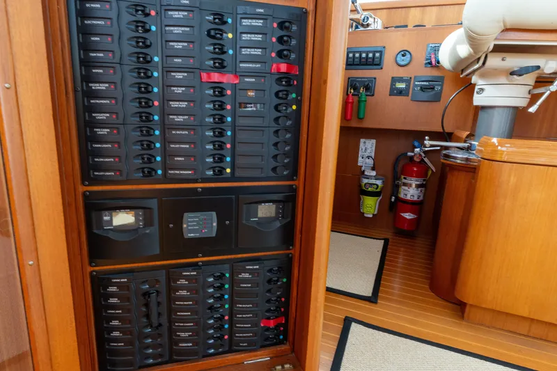 Slide: The Image of Electrical panel and controls inside a 2009 Grand Banks 45 Eastbay SX yacht. - 48