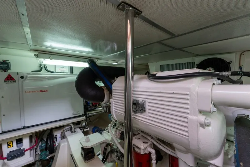 Slide: The Image of Engine room of 2009 Grand Banks 45 Eastbay SX with Cummins Onan generator. - 83