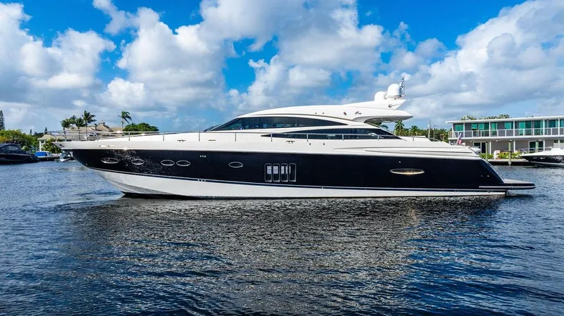 The Image of Luxurious 2010 Princess V78 yacht cruising on a sunny day with blue skies. - 0