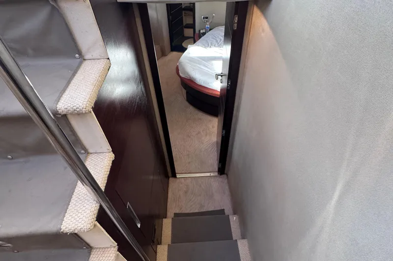 Slide: The Image of Staircase leading to bedroom in 2006 Azimut 68S yacht interior. - 65