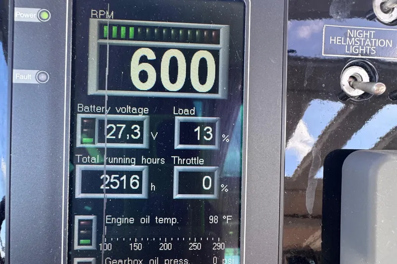 Slide: The Image of Control panel of a 2006 Azimut 68S yacht displaying RPM and engine data. - 26