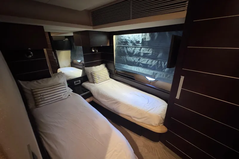 Slide: The Image of Luxurious twin cabin interior of 2006 Azimut 68S yacht with modern design elements. - 62