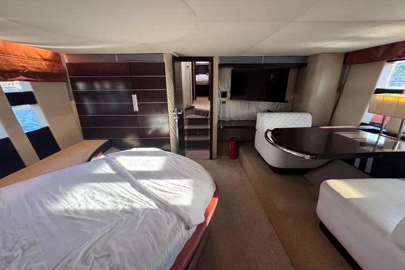 Slide: The Image of Luxurious interior of a 2006 Azimut 68S yacht with modern furnishings and elegant design. - 72