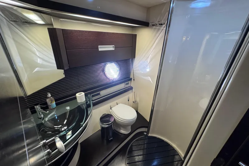 Slide: The Image of Luxurious bathroom in 2006 Azimut 68S yacht with modern fixtures and elegant design. - 53