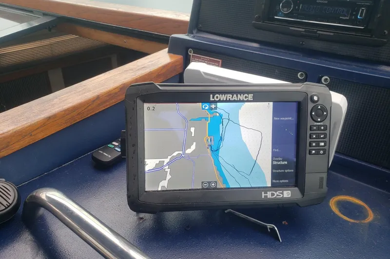 Slide: The Image of Lowrance HDS-9 marine GPS on 1988 Sea Ray 390 Express Cruiser dashboard. - 20