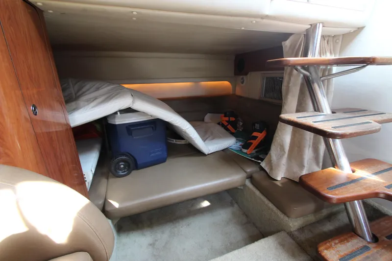 Slide: The Image of Interior cabin of 2008 Crownline 340 CR boat with seating and storage. - 37