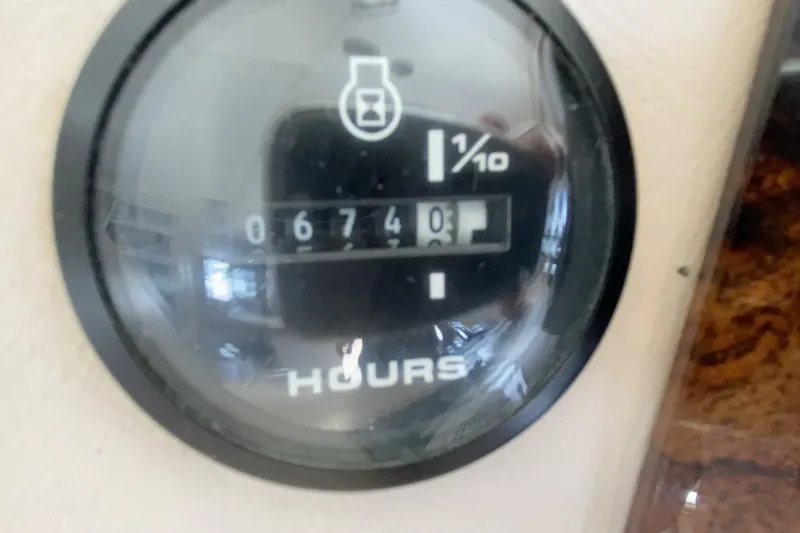 Slide: The Image of Hour meter reading 674.3 on a 2000 Gibson 37 Sport Series. - 29