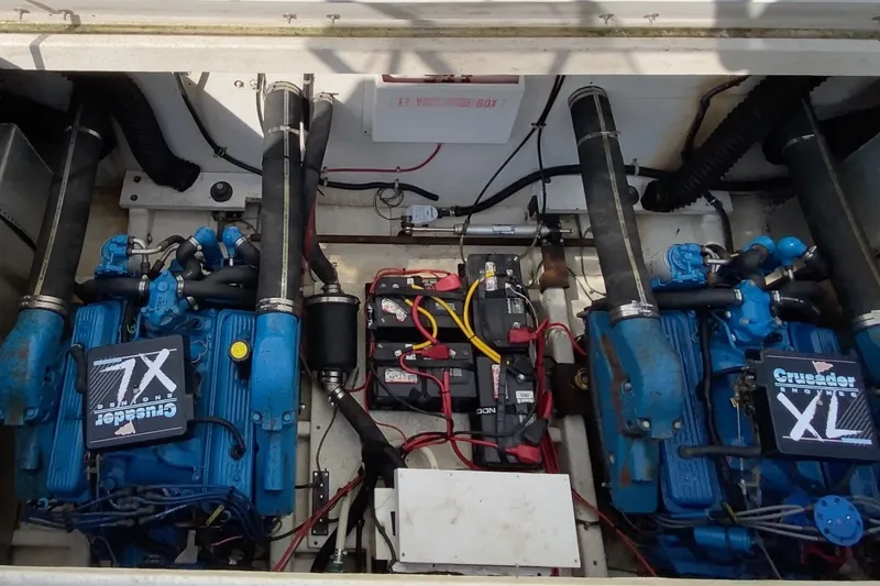 Slide: The Image of Engine compartment of a 2000 Gibson 37 Sport Series boat with dual Crusader XL engines. - 28