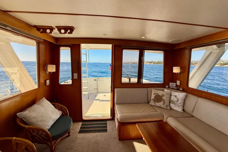 Slide: The Image of Interior of 1997 Offshore Yachts 48 Sedan with ocean view through windows. - 53