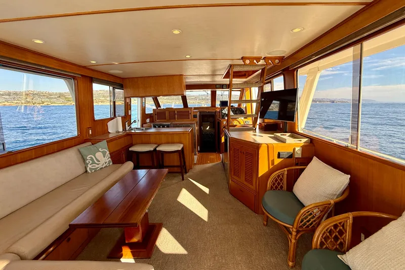 Slide: The Image of Luxurious interior of a 1997 Offshore Yachts 48 Sedan with ocean view. - 36