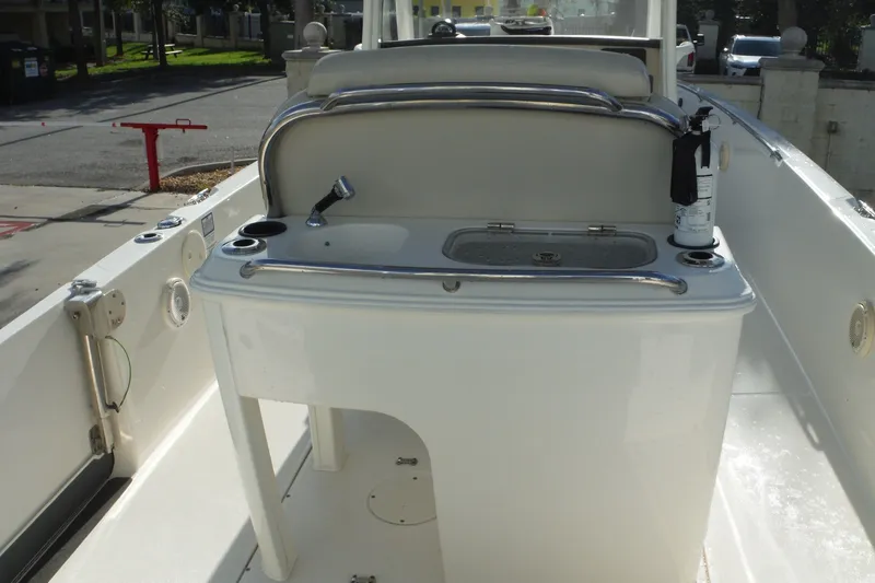 Slide: The Image of 2020 Boston Whaler 270 Dauntless boat interior with sink and fire extinguisher. - 16