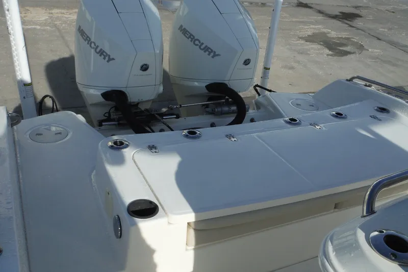 Slide: The Image of 2020 Boston Whaler 270 Dauntless boat with dual Mercury engines. - 32
