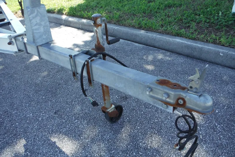 Slide: The Image of Trailer hitch of a 1999 Pro Sports 2200 CC, showing rust and wear. - 35