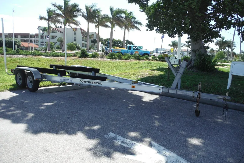 Slide: The Image of Trailer parked near palm trees, Continental brand, sunny day, 1999 Pro Sports 2200 CC. - 34