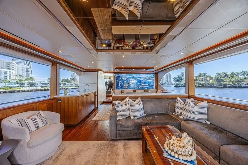 Slide: The Image of Luxurious interior of 2018 Ocean Alexander 85 E yacht with elegant seating and large windows. - 25