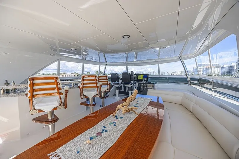 Slide: The Image of Luxurious interior of 2018 Ocean Alexander 85 E yacht with elegant seating and panoramic views. - 12