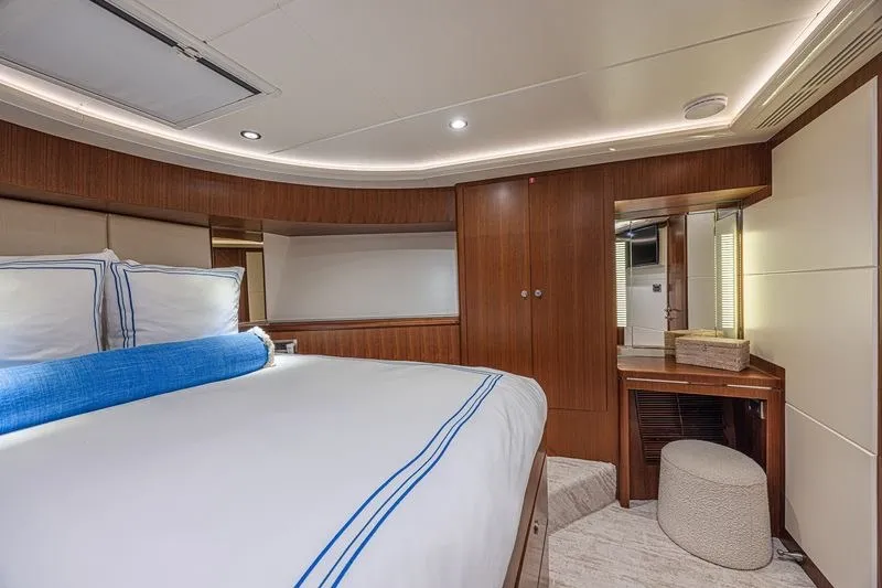 Slide: The Image of Luxurious bedroom interior of 2018 Ocean Alexander 85 E yacht with elegant wood finishes. - 32