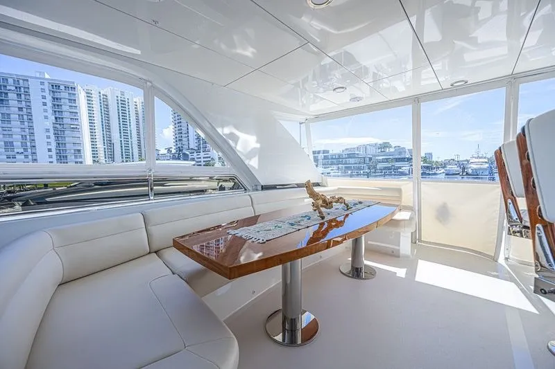 Slide: The Image of Luxurious interior of 2018 Ocean Alexander 85 E yacht with elegant seating and table. - 9