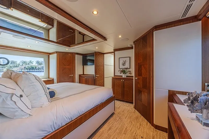 Slide: The Image of Luxurious bedroom interior of 2018 Ocean Alexander 85 E yacht with elegant wood finishes. - 29