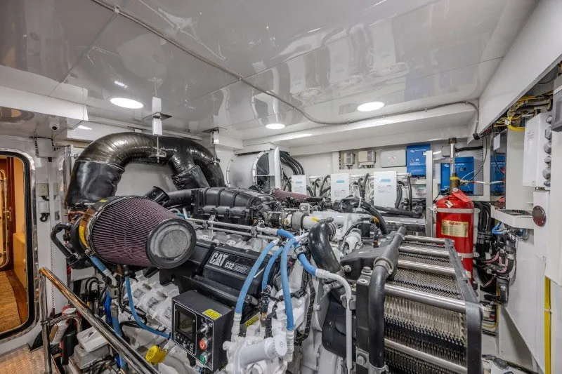 Slide: The Image of Engine room of 2018 Ocean Alexander 85 E yacht, featuring advanced machinery and equipment. - 45