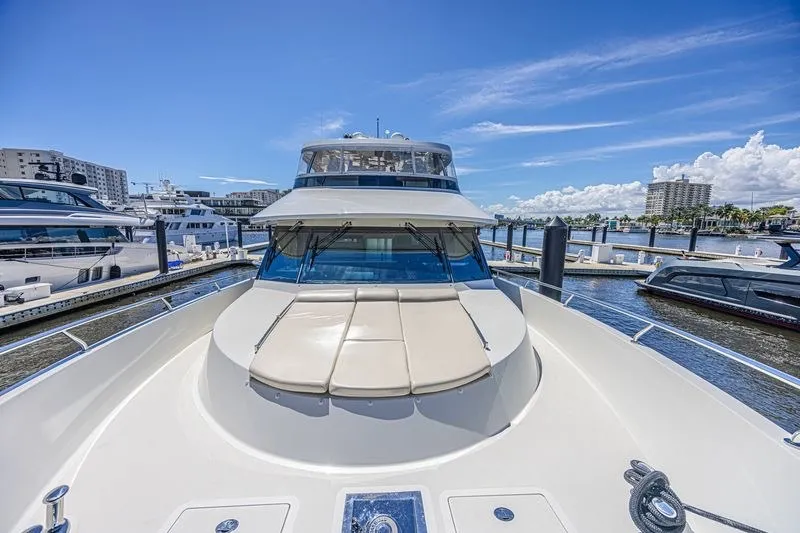 Slide: The Image of Luxurious 2018 Ocean Alexander 85 E yacht docked under clear blue skies. - 8