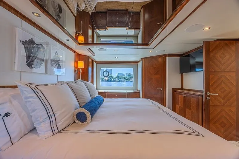 Slide: The Image of Luxurious bedroom interior of 2018 Ocean Alexander 85 E yacht with elegant wood finishes. - 35